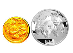 2010年12月10日,央行发行2011版熊猫金银纪念币一套,含金币7枚、银币3枚,均为国家法定货币。金银纪念币正面图案为北京天坛祈年殿 2010年12月10日,央行发行2011版熊猫金银纪念币一套,含金币7枚、银币3枚,均为国家法定货币。金银纪念币正面图案为北京天坛祈年殿
