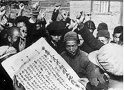 阅读下列两幅反映土地改革情况的照片,回答问题:图1农民拔出地主立的地界碑图2向农民宣传《土地改革法》(1 阅读下列两幅反映土地改革情况的照片,回答问题:图1农民拔出地主立的地界碑图2向农民宣传《土地改革法》(1