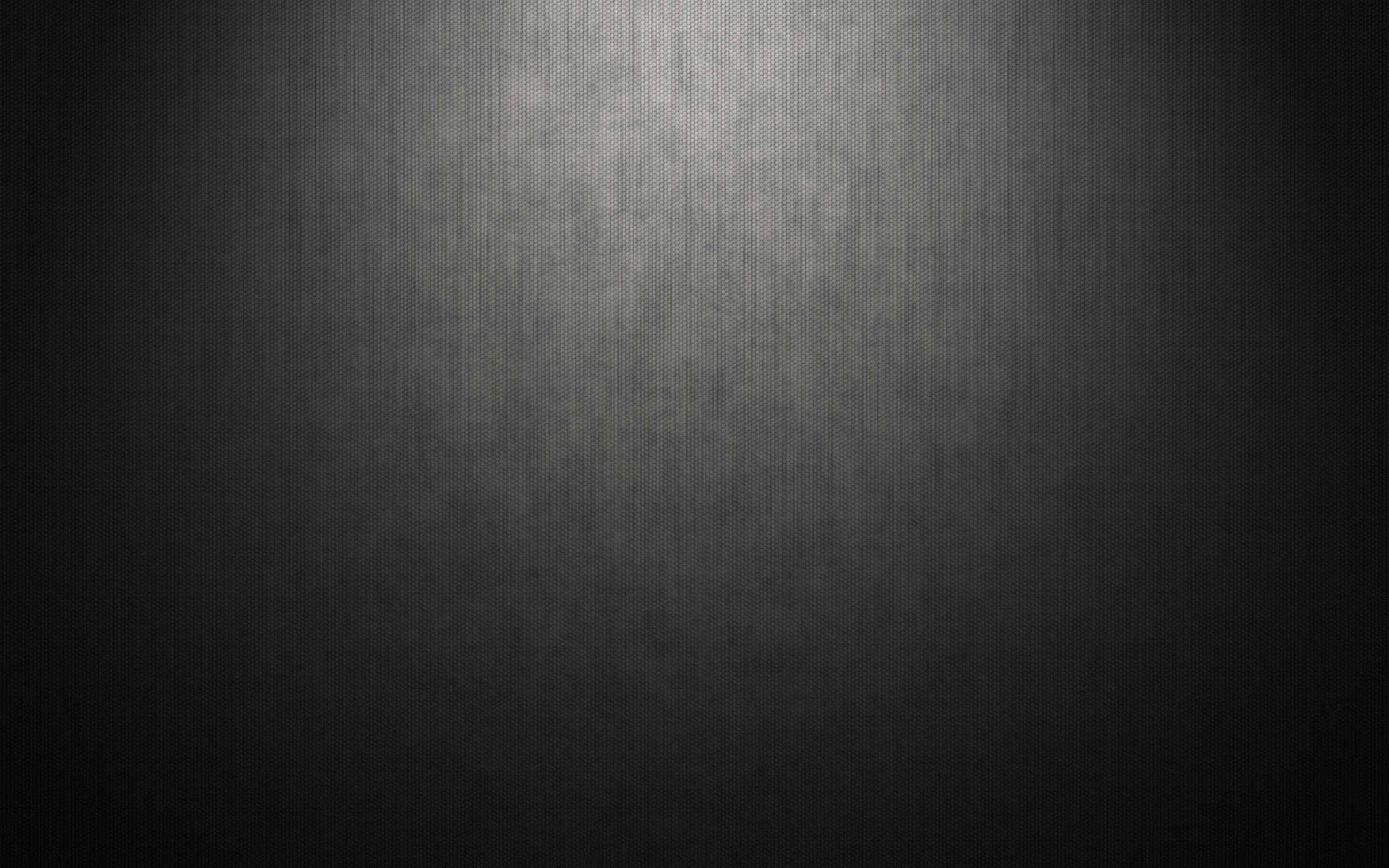 聚光灯效果的黑色布纹纹理_PPT背景图片_PPT课件背景图片